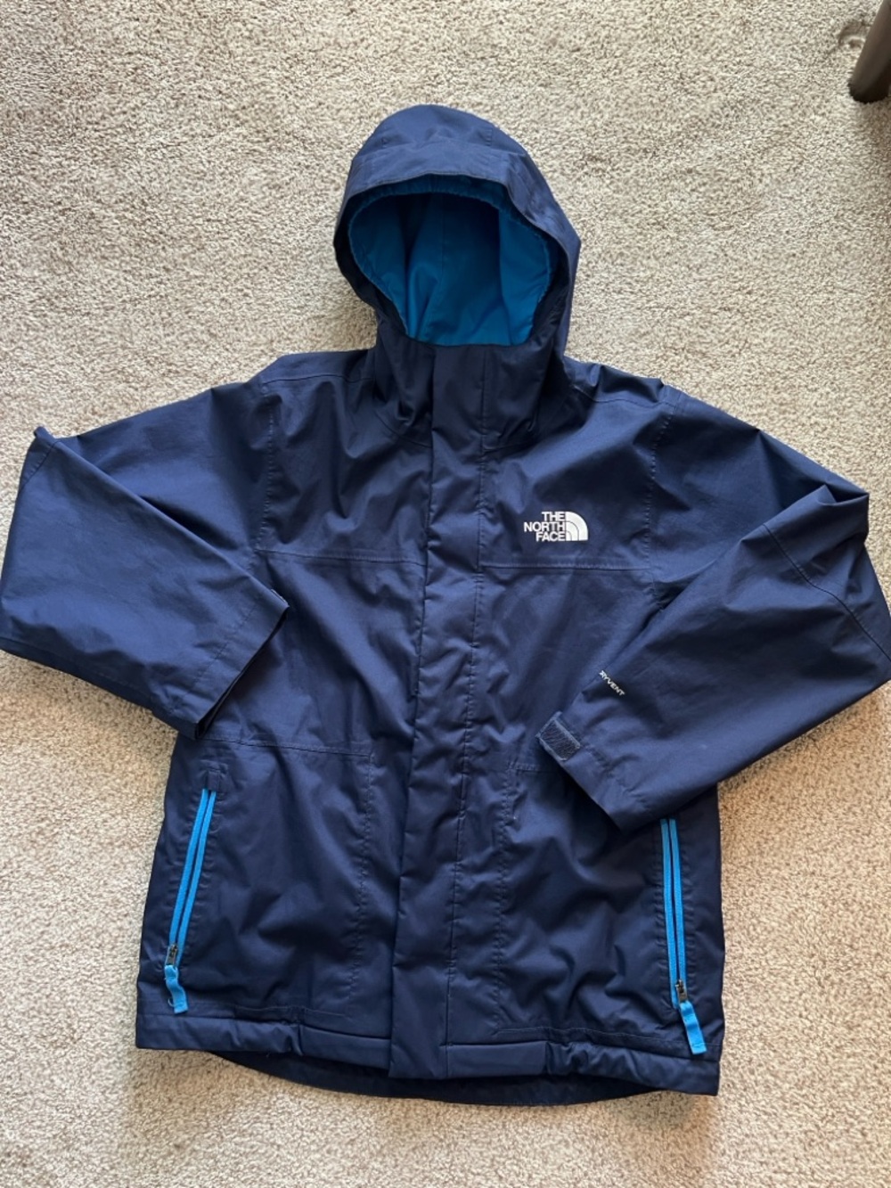 The North Face Kids Navy Blue Raincoat with Bright Blue Accents